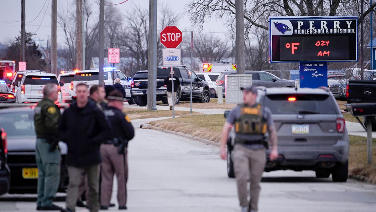 Police respond to Perry High School in Perry, Iowa