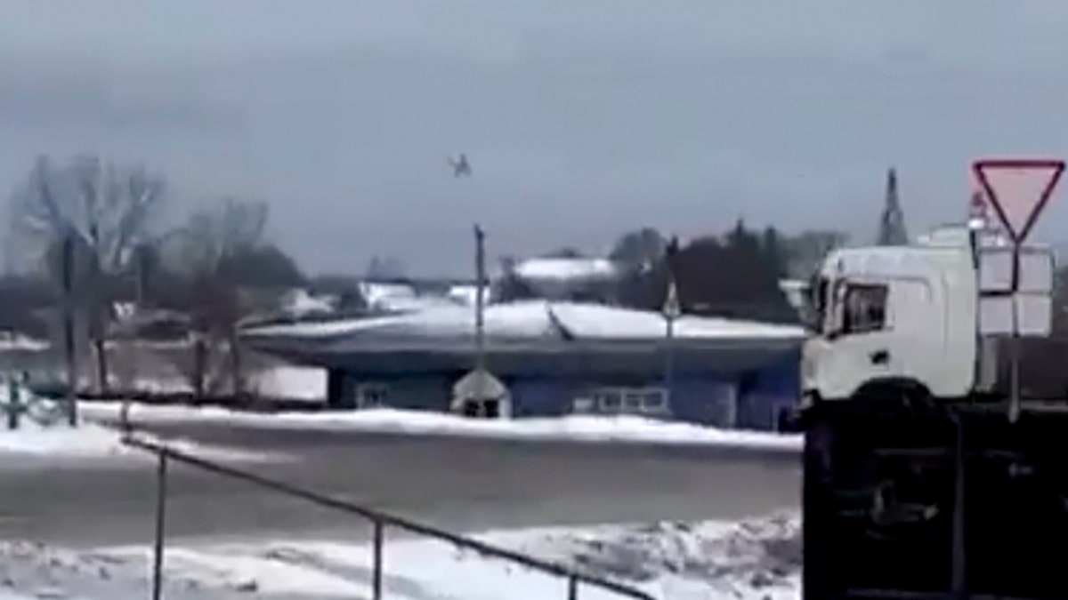 Video screencapture shows a Russian warplane flying before it crashed in the Belgorod region