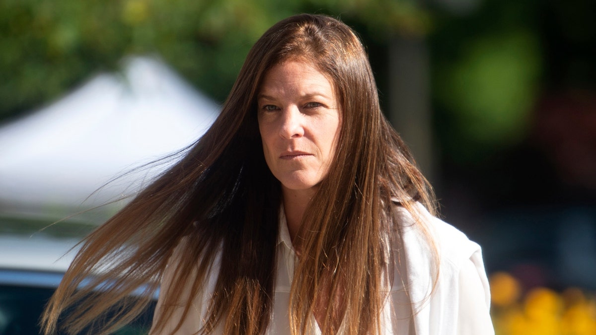 Michelle Troconis enters Superior Court in Stamford ahead of a June 28th hearing