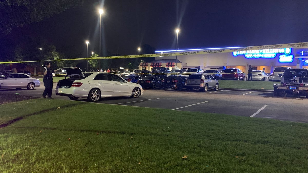 Gwinnet County Police find a woman's body outside a South Korean spa in the Atlanta metropolitan area
