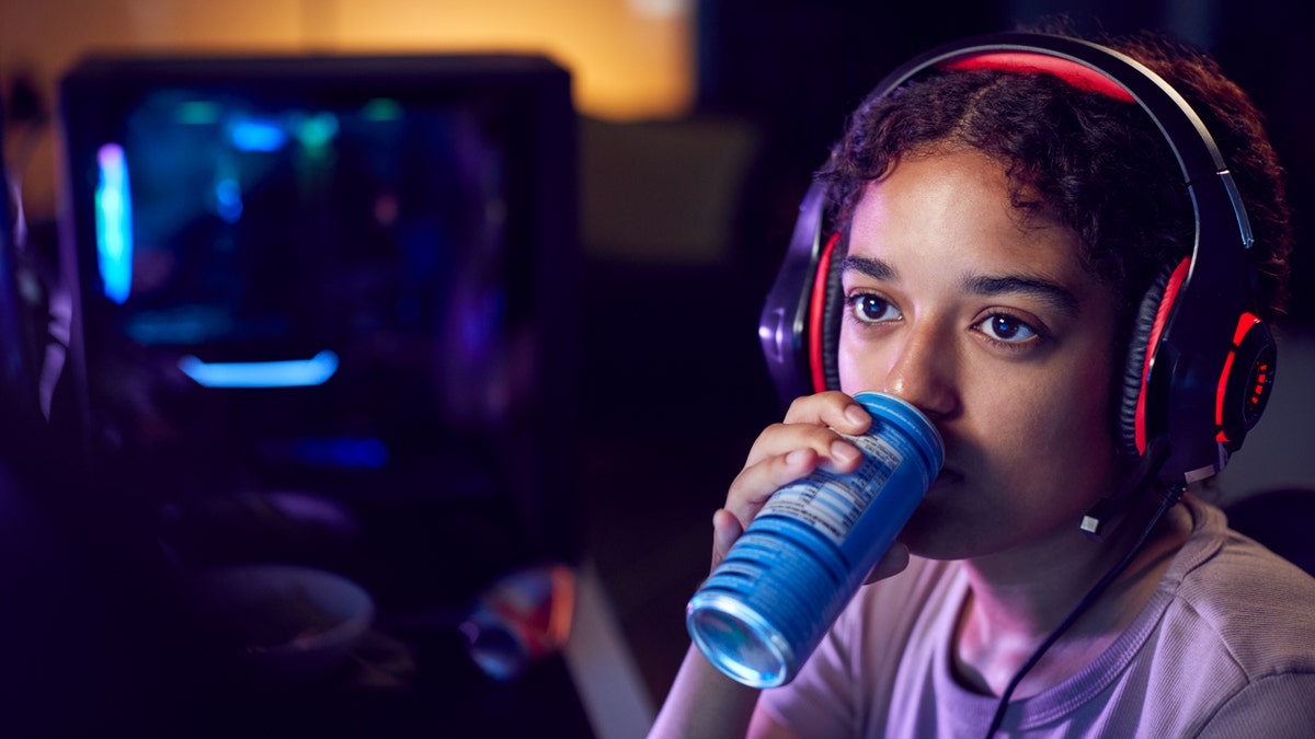 Girl drinking energy drink