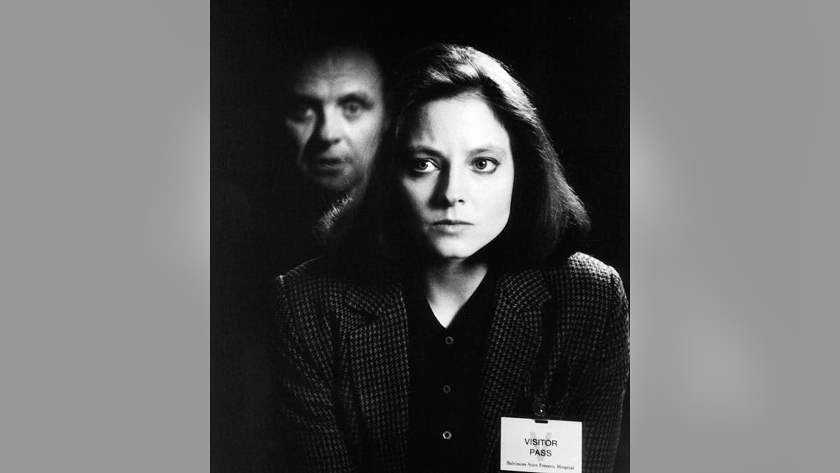 A black and white photo of Anthony Hopkins and Jodie Foster in "The Silence of the Lambs"