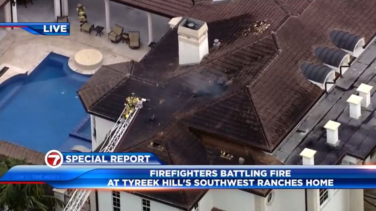 Tyreek Hill's home's roof on fire