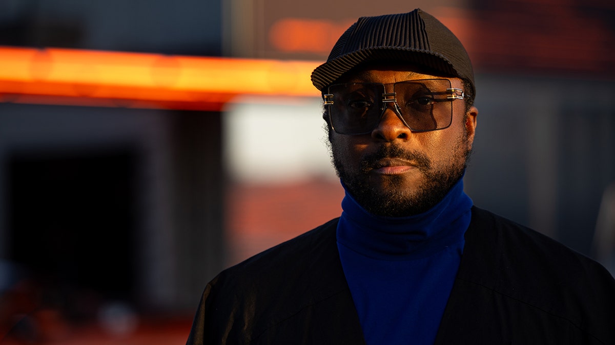 Close up of Will.i.am in sunglasses