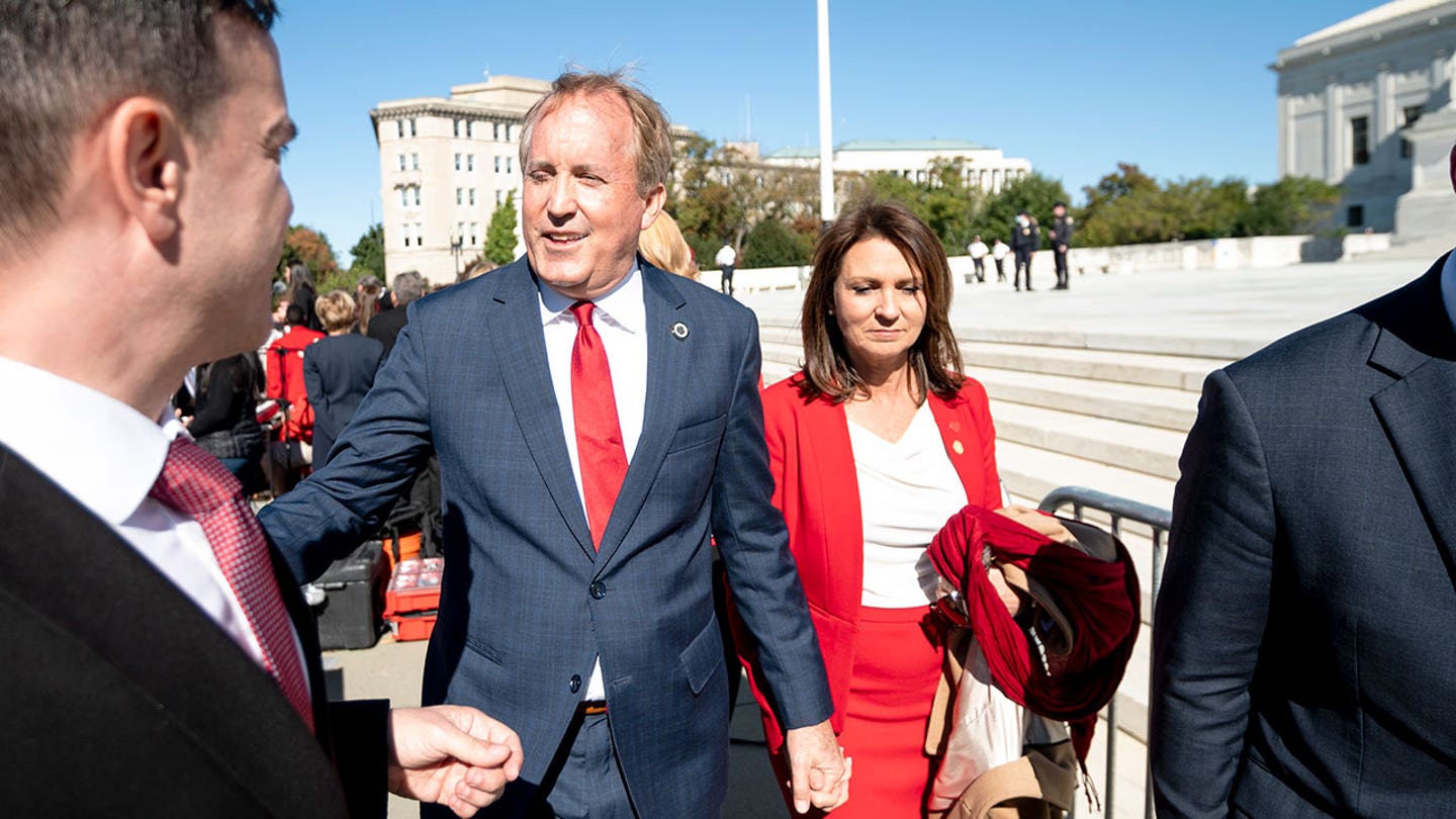 Ken Paxton and wife Angela