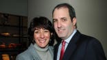 Ghislaine Maxwell and Doug Band standing together at a Valentine's Day tea party in New York City
