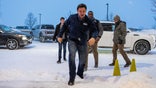 A blizzard curtails campaiging in Iowa ahead of the caucuses