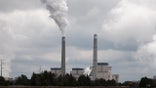 The Sherburne County Generating Station is pictured in Becker, Minnesota with steam rising from one of the stacks.