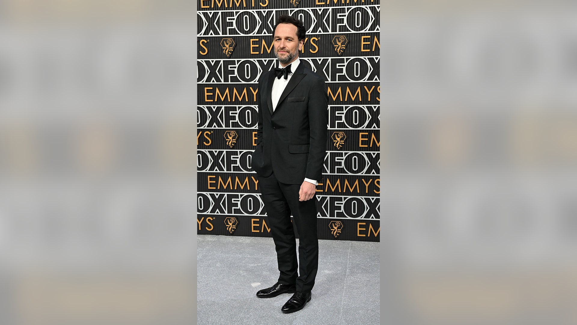 Matthew Rhys arrives for the 75th Emmy Awards
