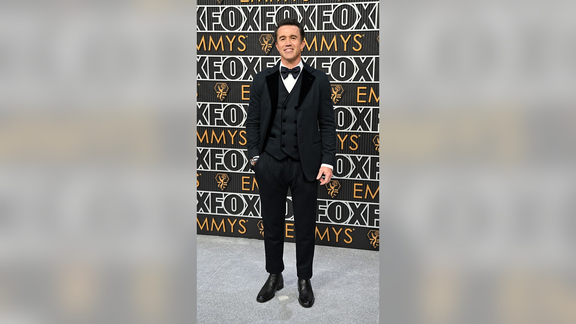 Rob McElhenney arrives for the 75th Emmy Awards