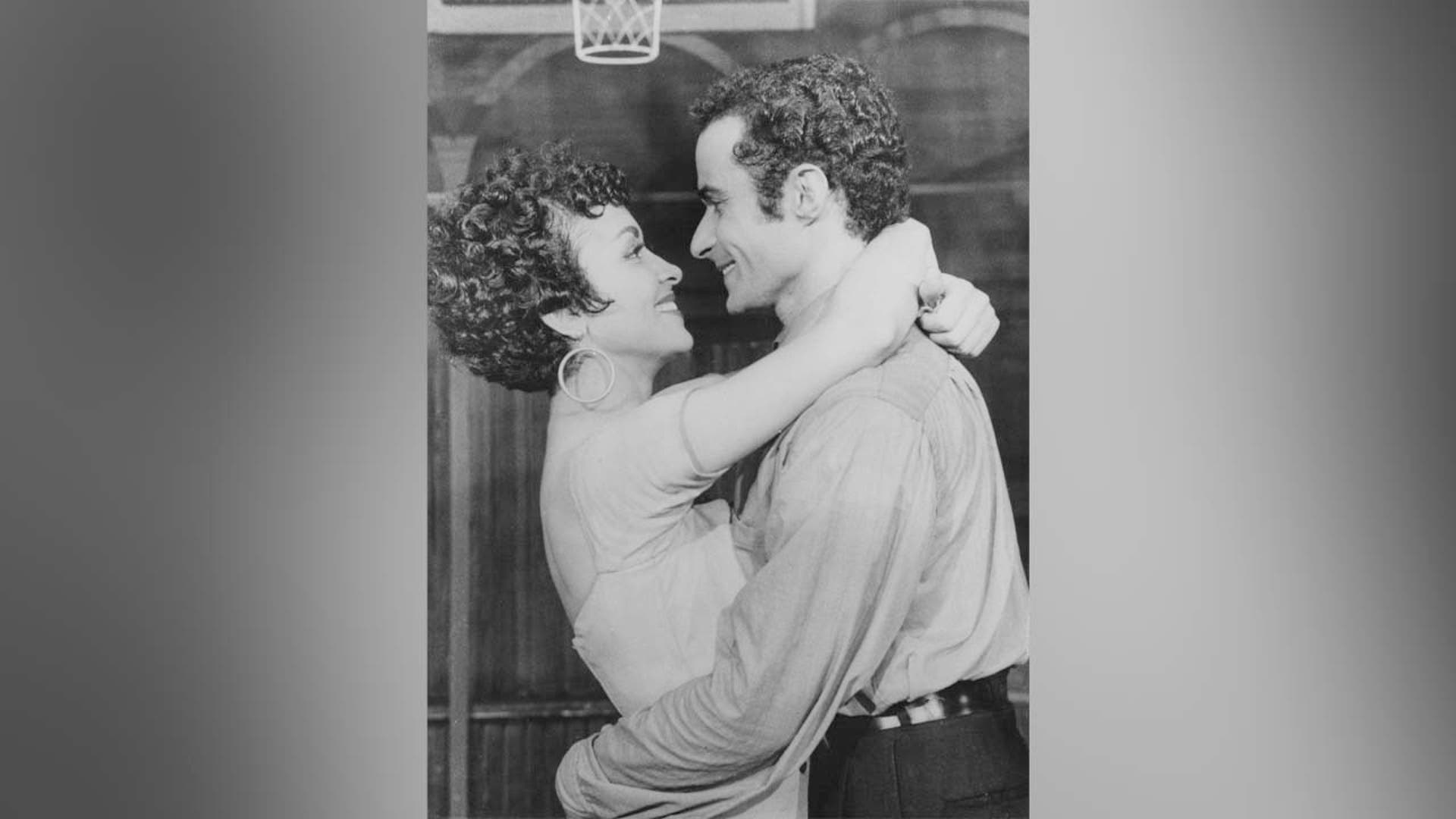 chita rivera hugging ken leroy in west side story