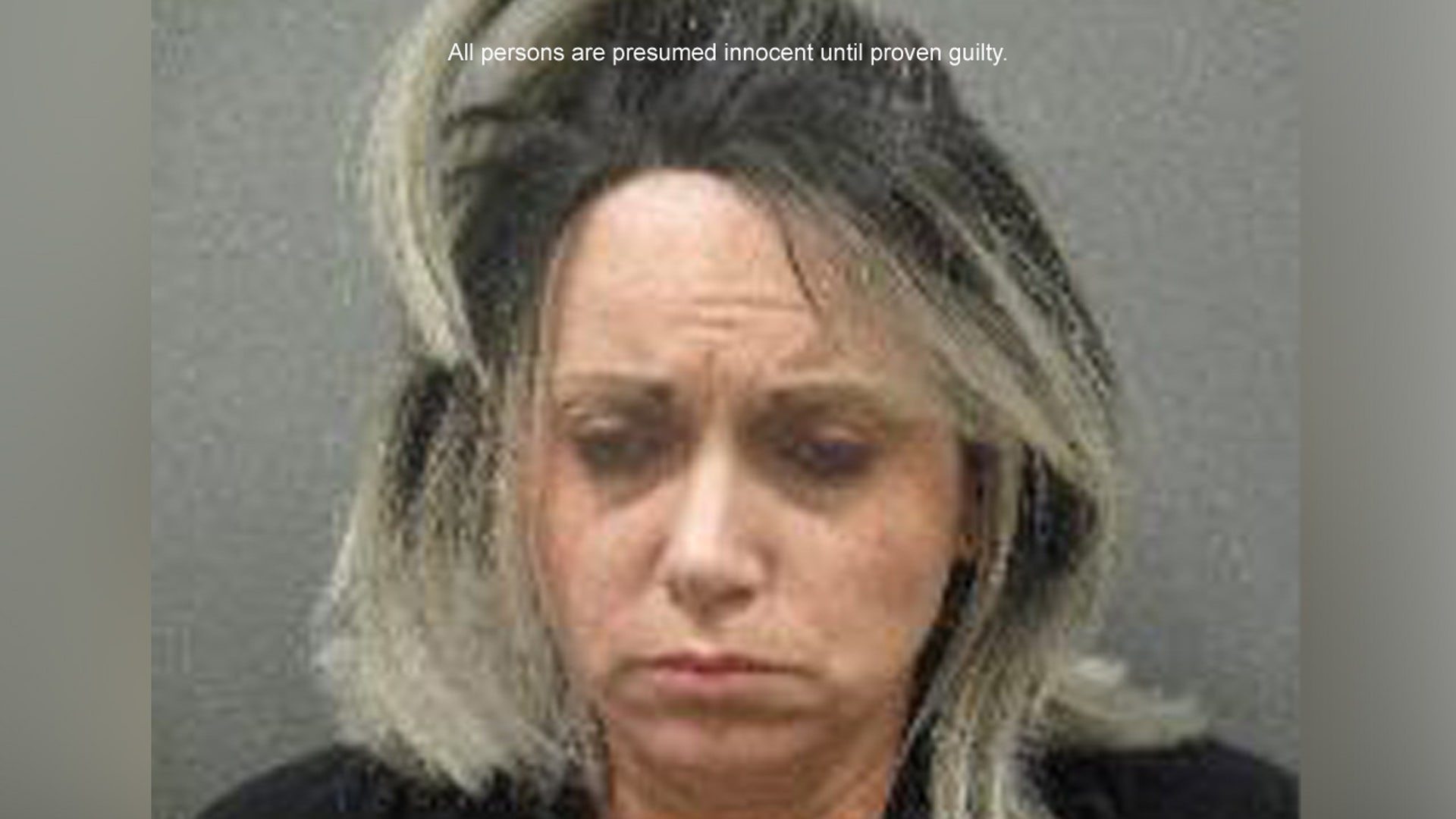 A mugshot of Ricci Foster