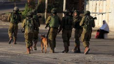 Israeli forces reveal footage of K9 unit clearing houses in Gaza, uncovering Hamas weapons
