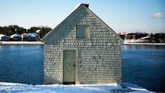 Maine residents mourn as record high tide washes away historic fishing shacks