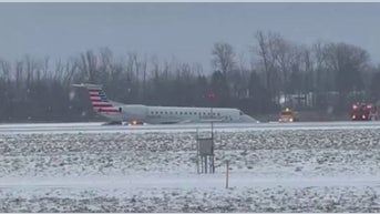American Airlines plane slides off taxiway during landing