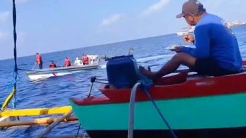 Defiant fisherman tells Chinese coast guard to 'go away' from disputed territory amid rising tensions