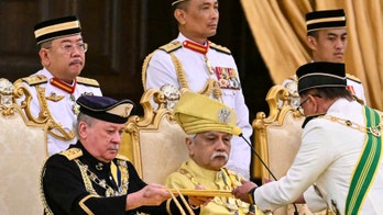 Malaysia swears in new king who promises hands-on leadership and economic revival
