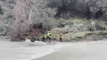 California woman rescued off overturned car after she was stranded for 15 hours in rushing water