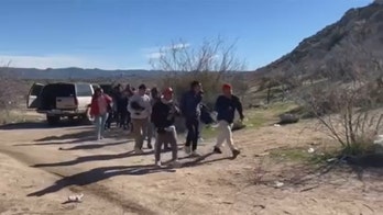 Video shows dozens of migrants delivered to border before entering US illegally