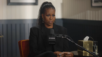 Michelle Obama urges parents not to try to be friends with their children