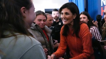 Down to Trump in the polls on primary eve, Haley vows she's 'in this for the long haul'