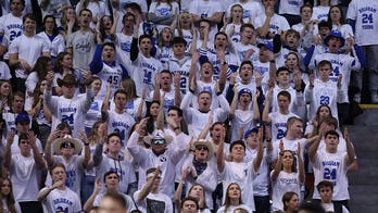 BYU fans asked to remove 'Horns Down' shirts during game against Texas: report