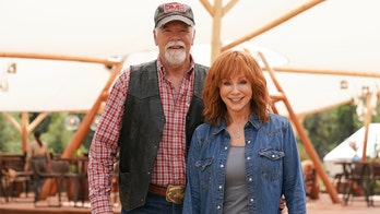 Reba McEntire says 'cowboy way of life' is at the heart of romance with boyfriend
