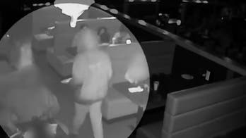 Massachusetts suspect seen fatally shooting victim in Japanese hibachi restaurant: video