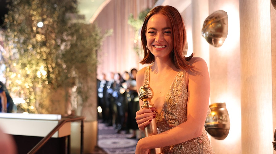 Emma Stone walks the red carpet at the 2024 Critics Choice Awards
