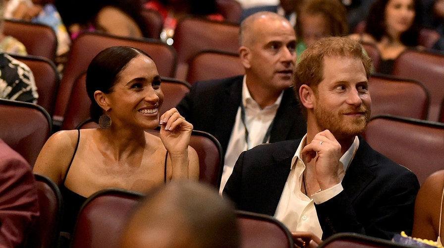 Prince Harry, Meghan Markle make rare public appearance at movie premiere