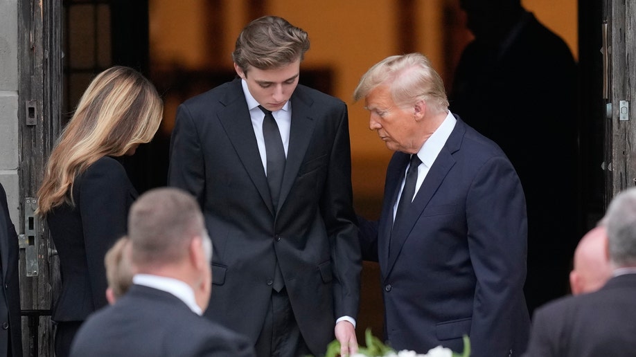 Donald Trump at the funeral of his mother in law with Melania Trump and Barron Trump