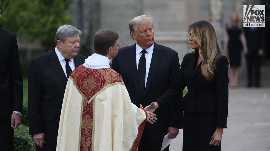 Reverend Tim Schenck shakes hands with former First Lady Melania Trump as she attends her mother Amalija Knavs funeral alongside former President Donald Trump and father Viktor Knavs
