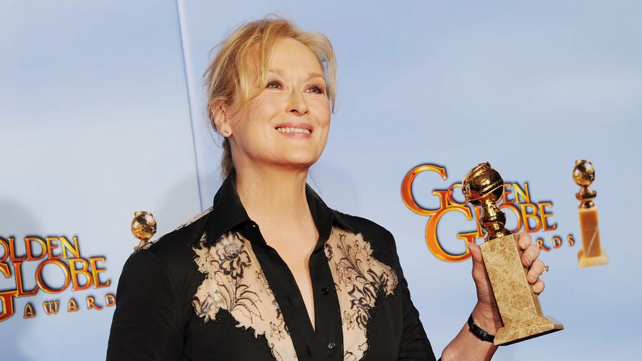 Actress Meryl Streep poses with her Golden Globe