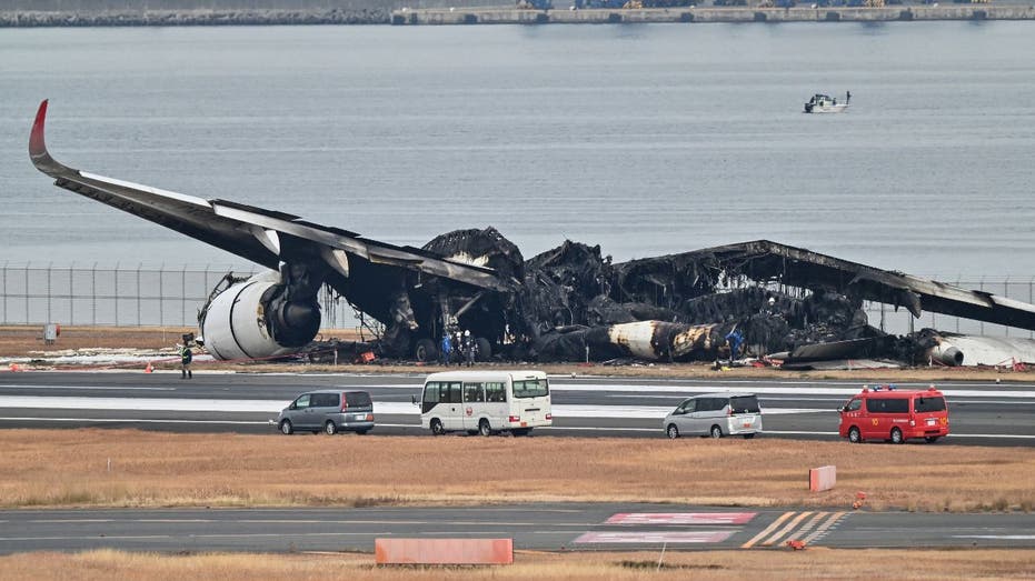 Japan launches 2 probes into deadly plane crash as transcripts are released