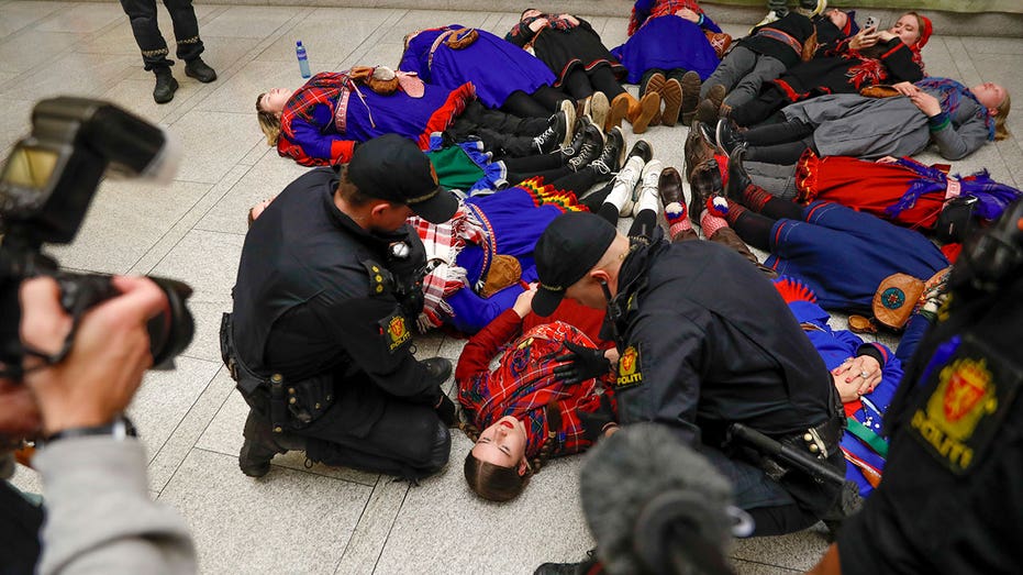 Activists in Norway  charged after blocking entrances to government offices to protest wind farm impact