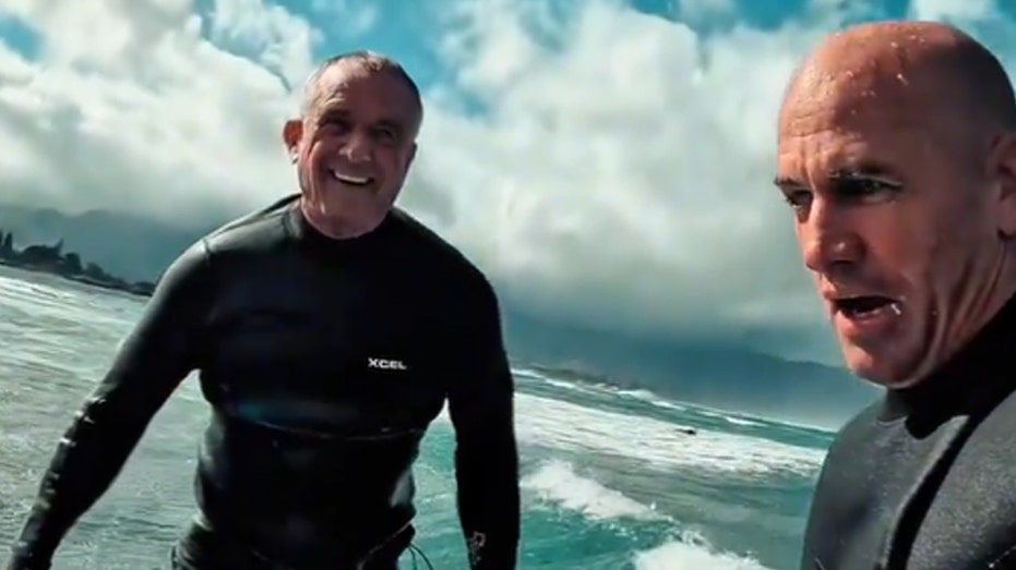 RFK, Jr catches waves with surfing legend Kelly Slater for birthday while campaigning in Hawaii