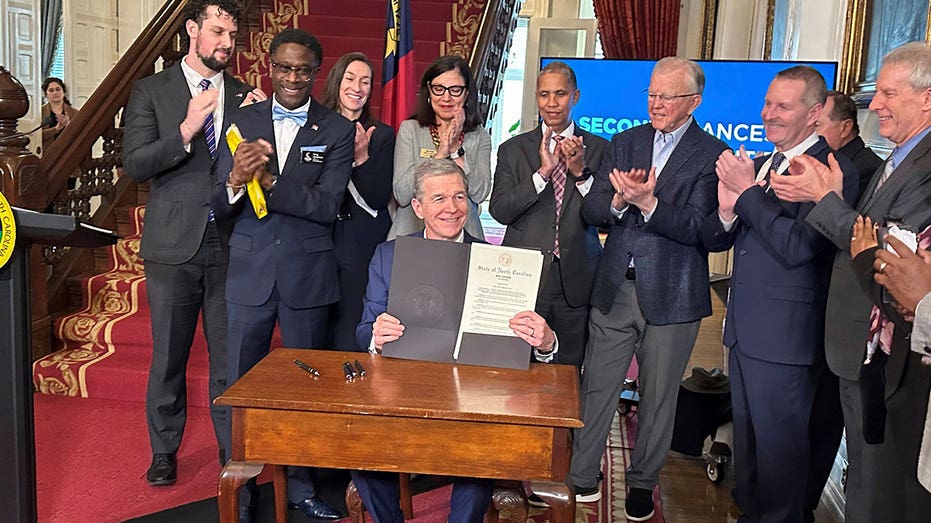 North Carolina Gov. Cooper signs executive order to support freed prisoners through education, assistance