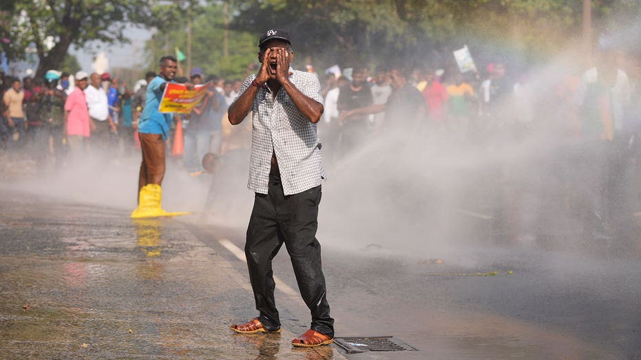 Sri Lanka police use tear gas to disperse opposition protest against economic conditions