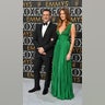 Jon Hamm and Anna Osceola arrive for the 75th Emmy Awards
