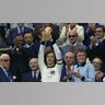 Franz Beckenbauer holds the trophy