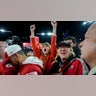 Taylor Swift walks with Donna Kelce on the field