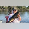 Buck McNeely holds a fish