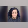A mugshot of Cassie Carter