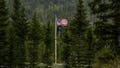 An American flag flies at Patriot Park, a collection of monuments in tribute to veterans in Columbia Falls, Maine, Saturday, May 27, 2023. The Worcester family was hoping to build a $1 billion flagpole theme park nearby, but an attorney said Friday, Feb. 2, 2024, that they won&rsquo;t pursue the project either in Washington County or elsewhere, and will look for other ways to honor veteran