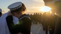 A sailor is welcomed back by a love ones after the Royal Navy aircraft carrier HMS Queen Elizabeth arrived in Portsmouth, returning home from her four-month Westlant deployment after successfully conducting flight trials of the F-35B fighter jets.