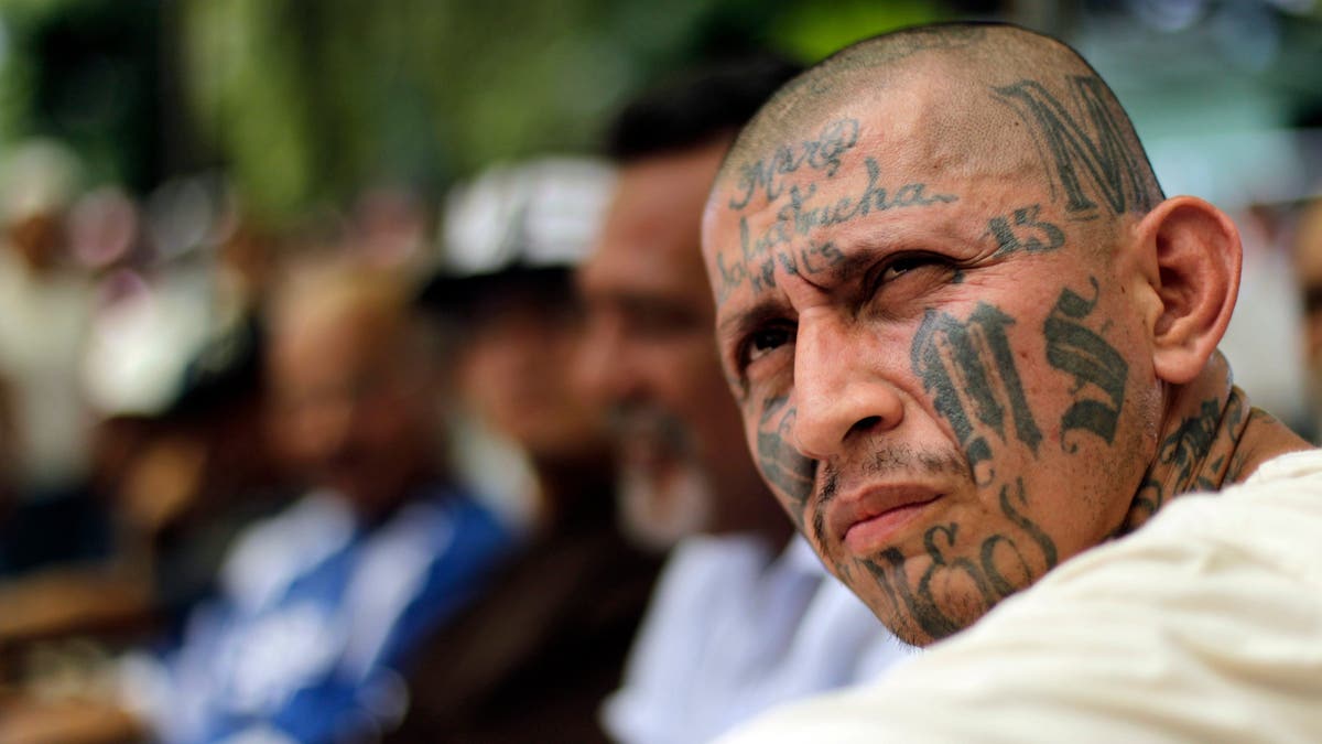 Carlos Tiberio Ramirez, one of the leaders of the Mara Salvatrucha (MS-13) gang attends the Day of the Virgin of Mercy celebrations at the female prison in San Salvador