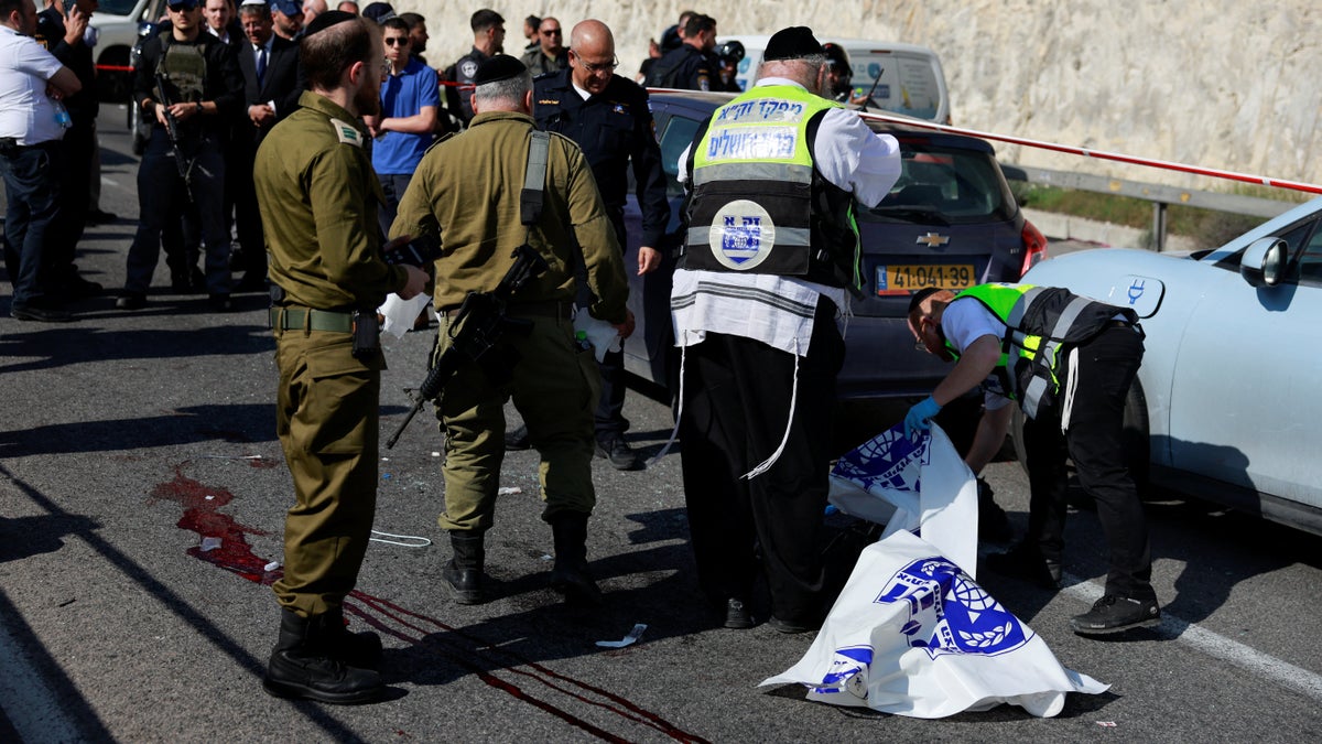 Two Palestinian gunmen were killed and one was injured after they opened fire near an Israeli checkpoint on Thursday.