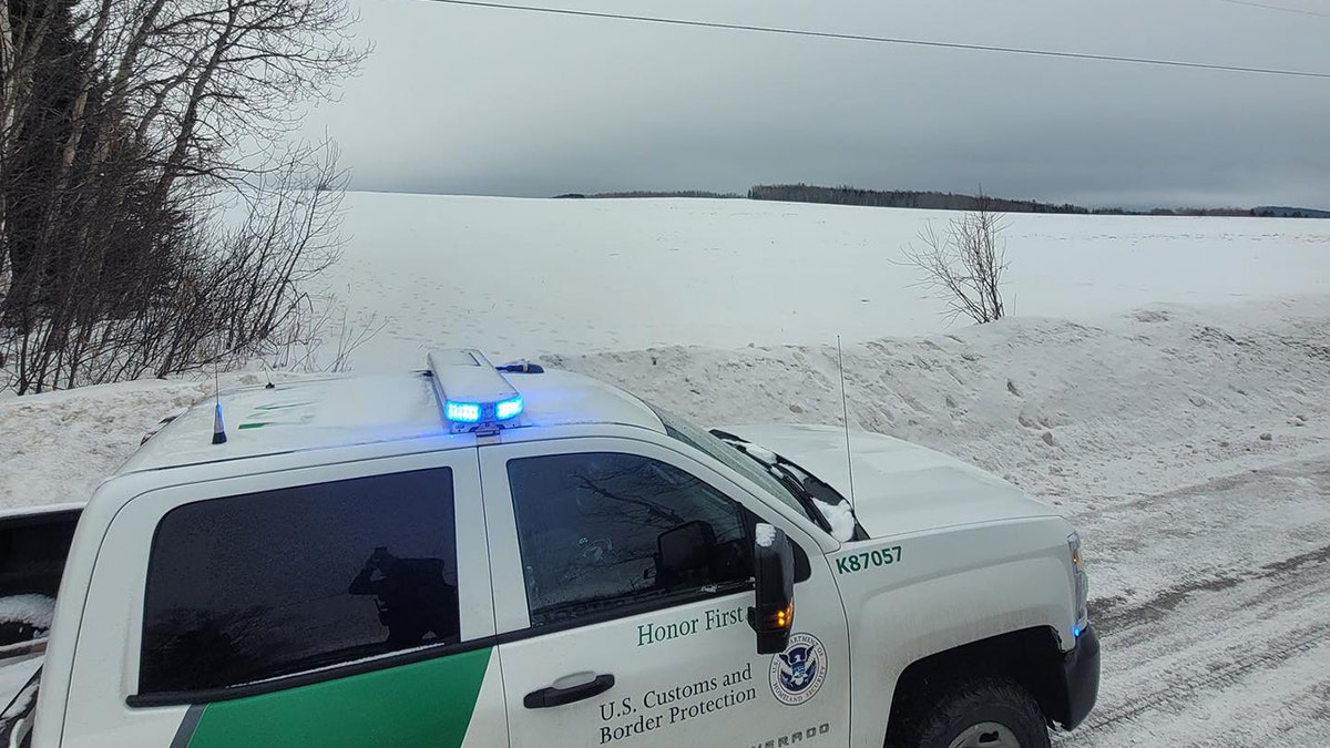 Snowy field, Border patrol vehicle