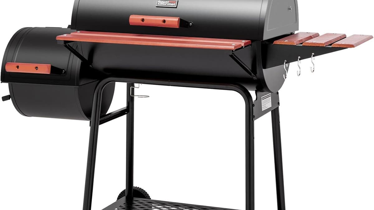 Cook all your food outdoors with this charcoal grill and smoker.