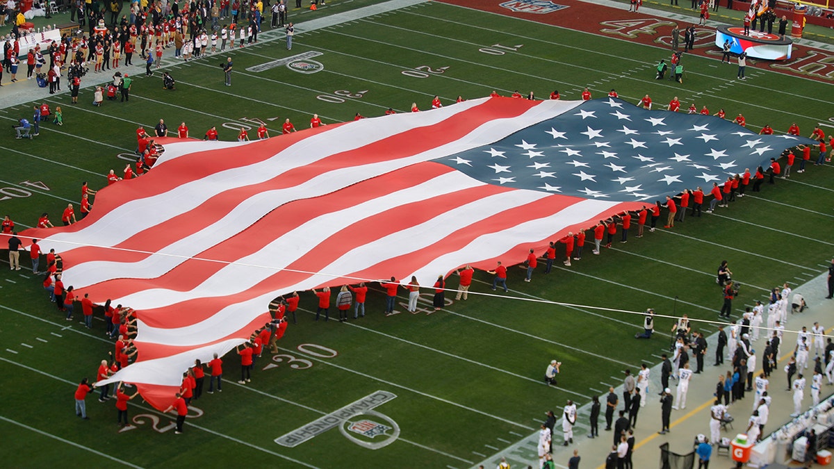 The U.S. flag at a football game